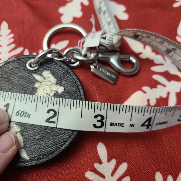 BLACK LEATHER KEYCHAIN WITH PUPPIES AND MIRROR - Picture 5 of 5